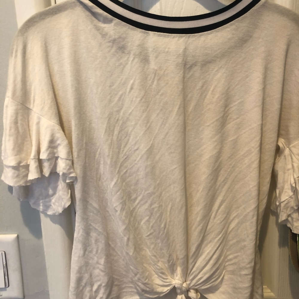 White ruffled sleeve top